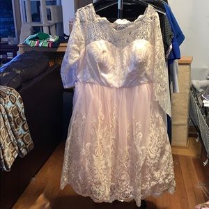 Blush/cream lace wedding dress.